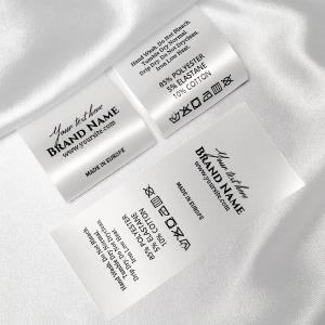 Vaatteiden pesumerkinnät - TC-M338